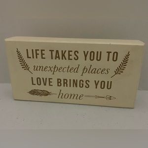 “Life takes you unexpected places, Love brings you home” Cream Colored Wall Art